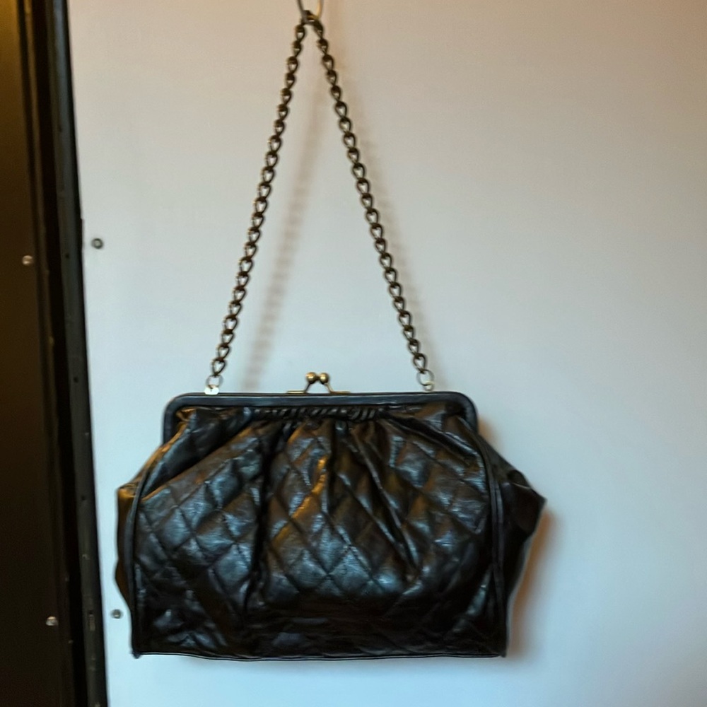 Black Chanel “esque” handbag with gold chain-link shoulder strap